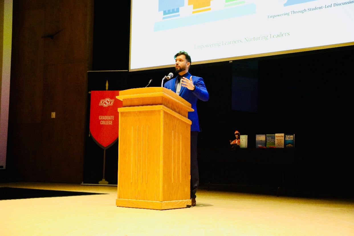 Dr. Kushal Jha speaking at a conference keynote